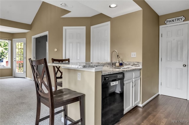 5 Keph Dr Unit 8, Amherst, NY 14228 - kitchen with dishwasher, a kitchen bar, light stone countertops, and white cabinetry