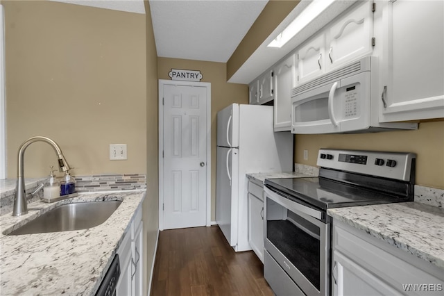 5 Keph Dr Unit 8, Amherst, NY 14228 - kitchen with white appliances, dark wood finished floors, white cabinetry, and light stone counters