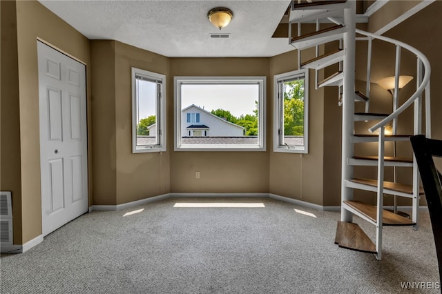 5 Keph Dr Unit 8, Amherst, NY 14228 - unfurnished bedroom featuring carpet floors and a textured ceiling