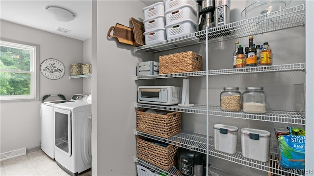 127 Boxelder Ln, Amherst, NY 14228 - washroom featuring washing machine and clothes dryer and baseboards
