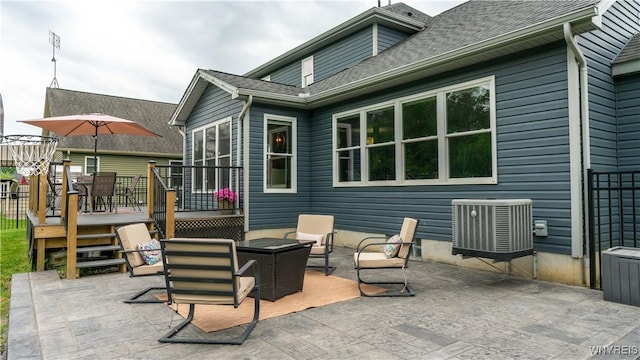 127 Boxelder Ln, Amherst, NY 14228 - view of patio featuring a wooden deck and outdoor dining space