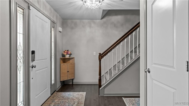127 Boxelder Ln, Amherst, NY 14228 - entryway with stairway, wood finished floors, and a chandelier