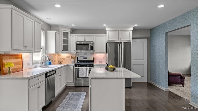 127 Boxelder Ln, Amherst, NY 14228 - kitchen featuring appliances with stainless steel finishes, dark wood-style flooring, white cabinetry, and recessed lighting