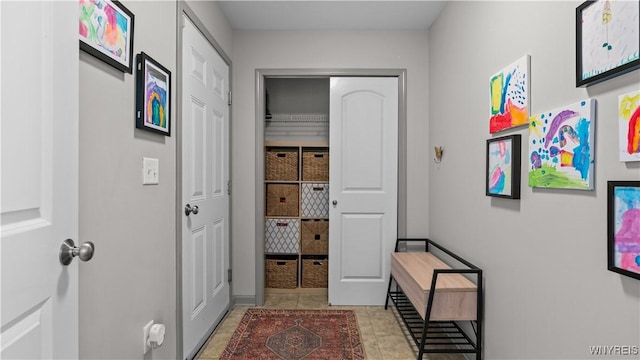 127 Boxelder Ln, Amherst, NY 14228 - hall with light tile patterned floors and baseboards