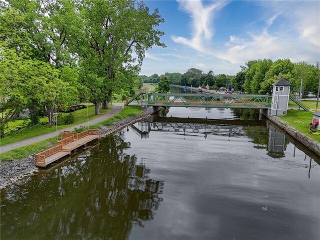 38 E Ave, Murray, NY 14470 - dock area featuring a water view and view of wooded area