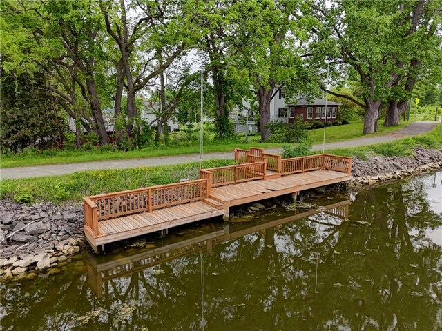 38 E Ave, Murray, NY 14470 - dock area featuring a water view, a yard, and view of wooded area