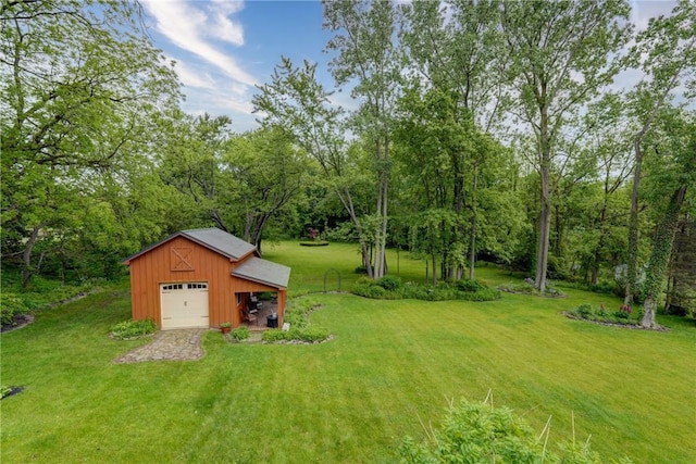 38 E Ave, Murray, NY 14470 - view of green lawn with an outdoor structure and a detached garage