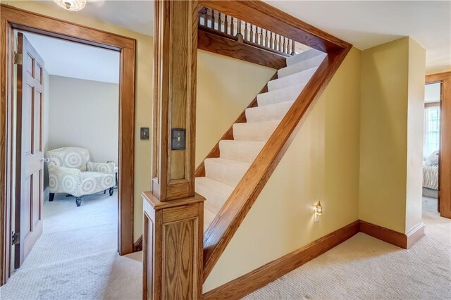 38 E Ave, Murray, NY 14470 - staircase featuring carpet and baseboards