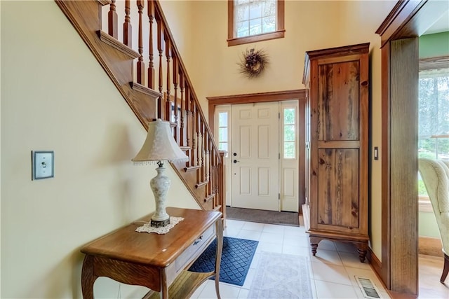 38 E Ave, Murray, NY 14470 - entryway with stairway and light tile patterned flooring