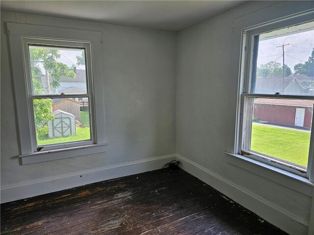 420 Schuyler Ave, Southport, NY 14904 - empty room featuring wood-type flooring and healthy amount of natural light