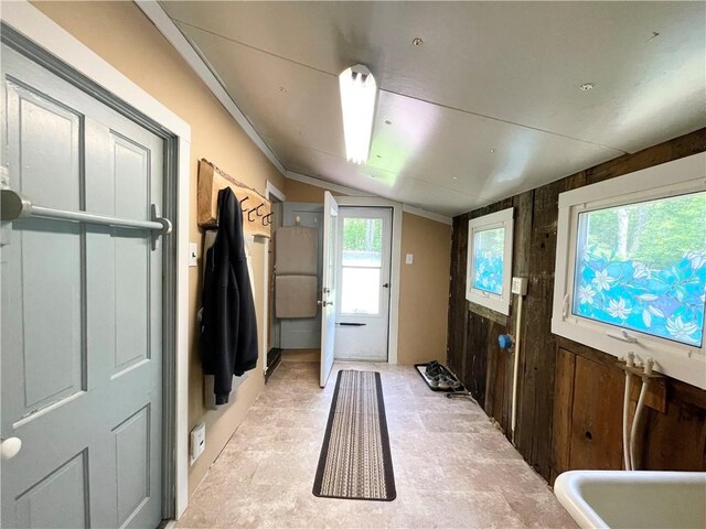 1663 Bingham Rd, Keating Town, PA 16726 - doorway with wooden walls and vaulted ceiling