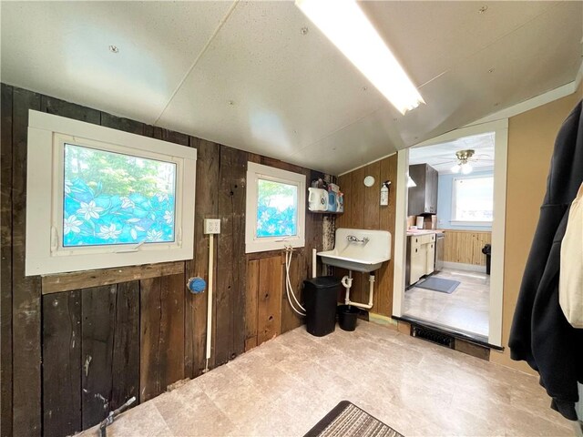 1663 Bingham Rd, Keating Town, PA 16726 - miscellaneous room with wood walls, plenty of natural light, and vaulted ceiling
