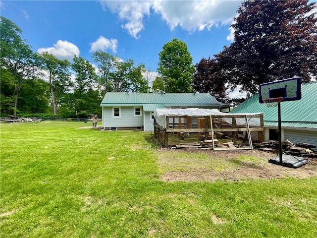 1663 Bingham Rd, Keating Town, PA 16726 - rear view of house featuring a lawn and a metal roof