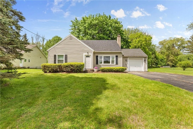 1617 Five Mile Line Rd, Penfield, NY 14526 - view of front facade with asphalt driveway, an attached garage, a chimney, and a front yard
