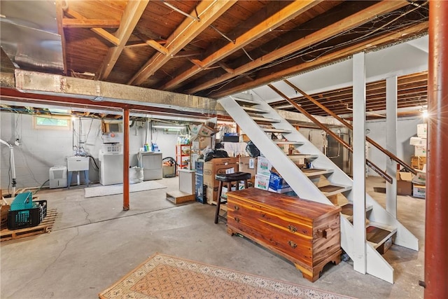 1617 Five Mile Line Rd, Penfield, NY 14526 - basement with stairs and washing machine and dryer
