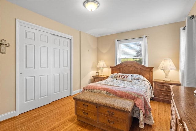 1617 Five Mile Line Rd, Penfield, NY 14526 - bedroom featuring light wood-style floors and a closet