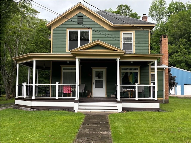 15 Water St, Worcester, NY 12197 - view of front of home with covered porch, a chimney, and a front lawn