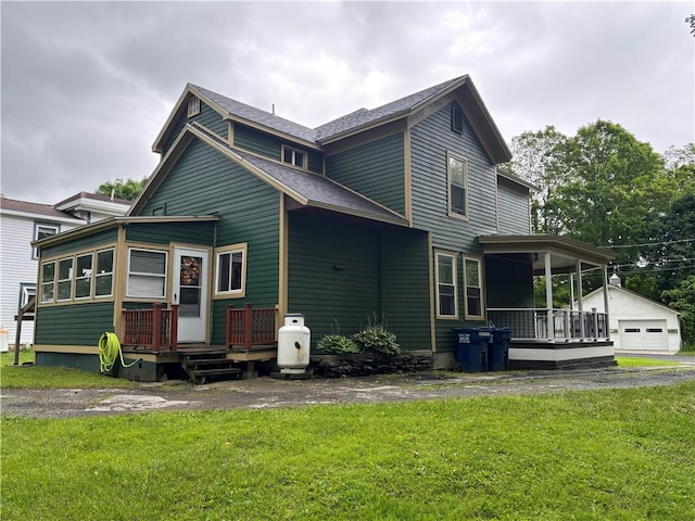 15 Water St, Worcester, NY 12197 - back of property with a yard, a wooden deck, and a shingled roof