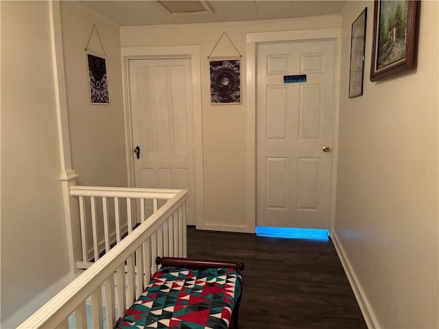 15 Water St, Worcester, NY 12197 - corridor with dark wood-type flooring, an upstairs landing, and crown molding
