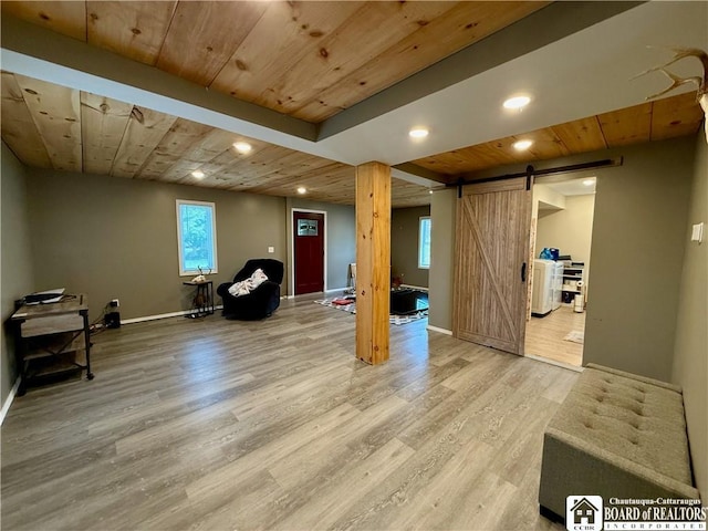 918 Crown St, Olean-City, NY 14760 - below grade area featuring wooden ceiling, light wood finished floors, a barn door, and recessed lighting