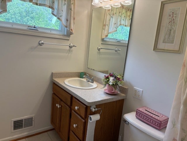 783 Whistlers Cove Ln, Greece, NY 14612 - half bath featuring vanity and tile patterned floors