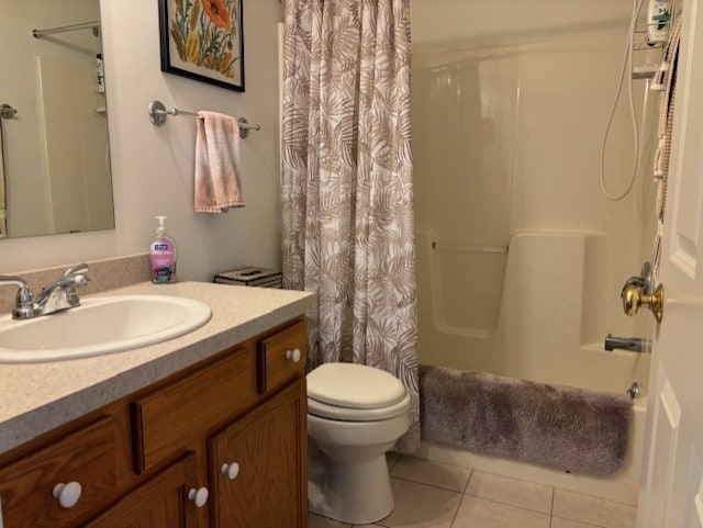 783 Whistlers Cove Ln, Greece, NY 14612 - bathroom with vanity, tile patterned flooring, and shower / bath combo with shower curtain