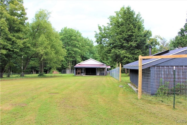 1808 Mulholland Rd, Vienna, NY 13123 - view of yard featuring an outdoor structure and view of scattered trees