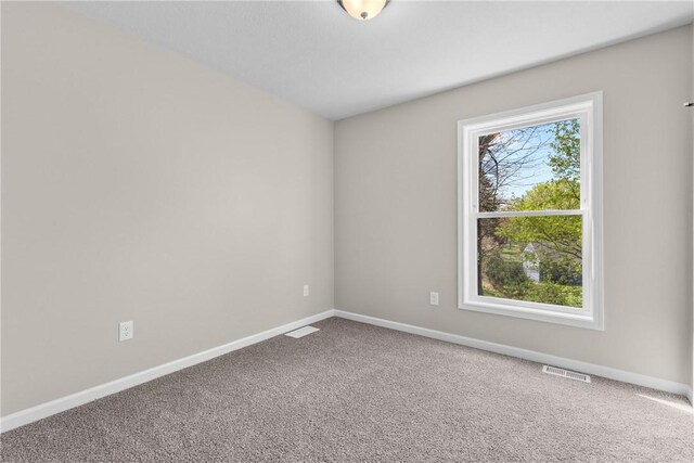 408 Kreag Rd, Perinton, NY 14534 - carpeted spare room featuring baseboards