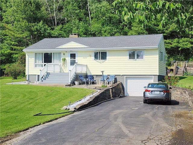 8637 State Route 415, Campbell, NY 14821 - view of front facade with stairway, asphalt driveway, a garage, and a chimney