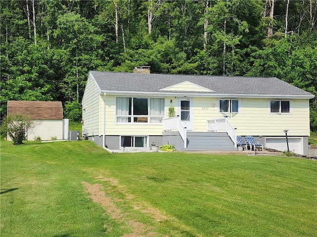 8637 State Route 415, Campbell, NY 14821 - view of front facade featuring an attached garage, a front yard, stairs, a shingled roof, and a chimney