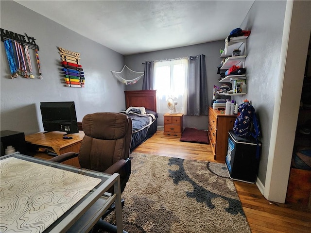 8637 State Route 415, Campbell, NY 14821 - bedroom with wood finished floors and a desk