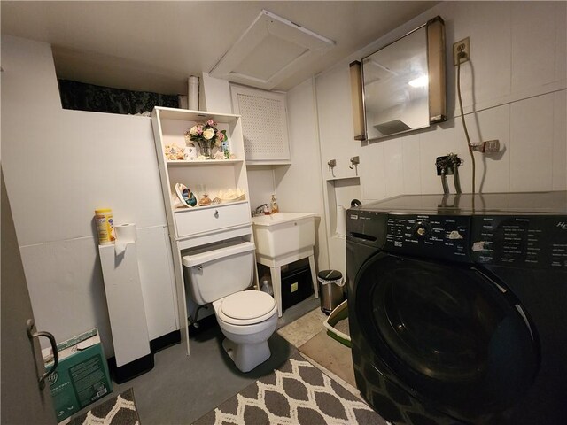 8637 State Route 415, Campbell, NY 14821 - bathroom with washer / clothes dryer and concrete floors