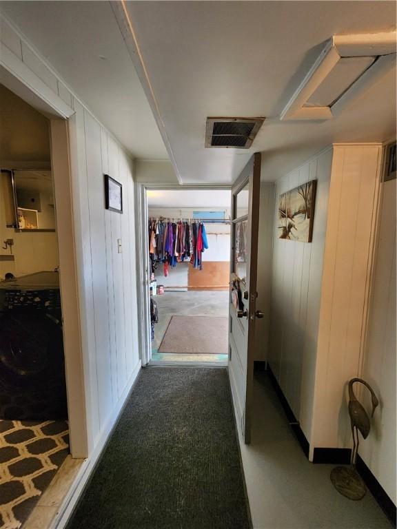 8637 State Route 415, Campbell, NY 14821 - hall featuring washer / clothes dryer and wooden walls