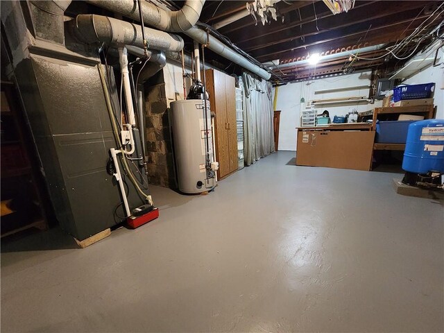 8637 State Route 415, Campbell, NY 14821 - unfinished basement with gas water heater and a water pressure tank