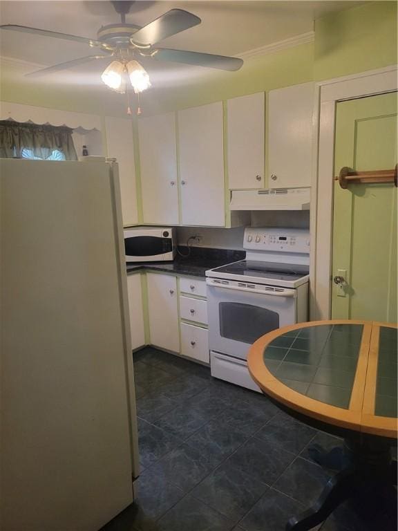 235 Congress Ave, Rochester, NY 14611 - kitchen featuring white appliances, under cabinet range hood, white cabinetry, ceiling fan, and dark countertops