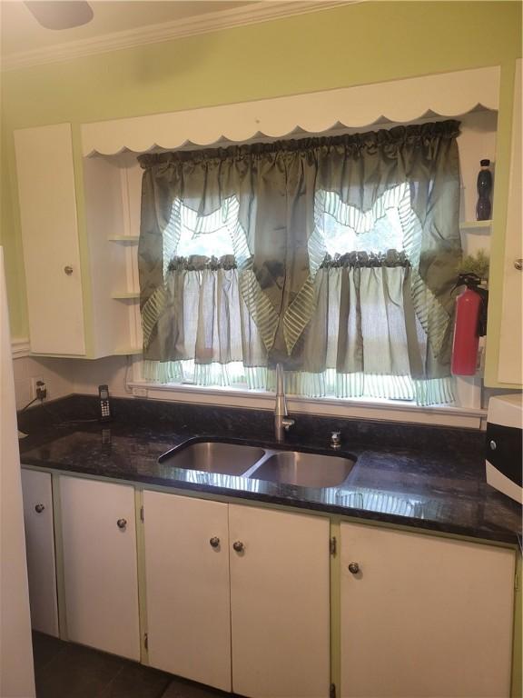 235 Congress Ave, Rochester, NY 14611 - kitchen with white cabinetry and crown molding