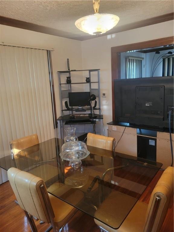 235 Congress Ave, Rochester, NY 14611 - dining room featuring a textured ceiling and wood finished floors
