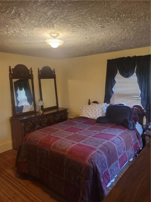 235 Congress Ave, Rochester, NY 14611 - bedroom featuring wood finished floors and a textured ceiling