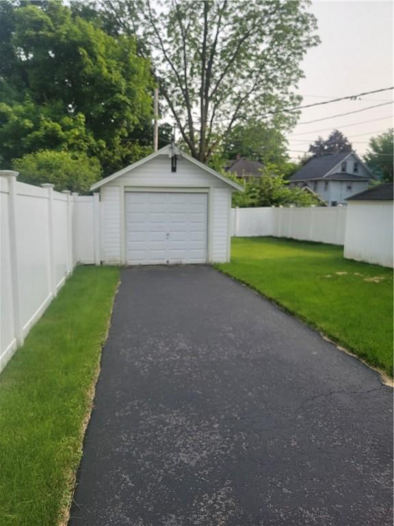 235 Congress Ave, Rochester, NY 14611 - detached garage featuring driveway