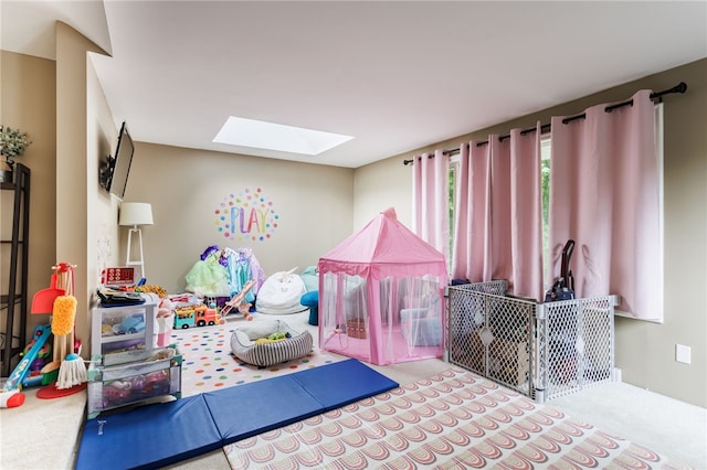 3389 Culver Rd, Irondequoit, NY 14622 - carpeted bedroom featuring a skylight