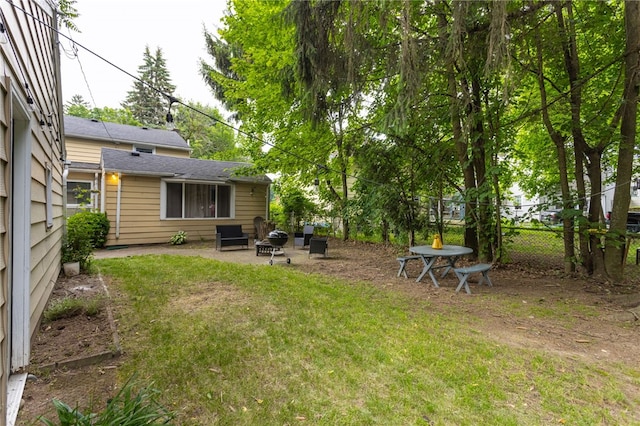 3389 Culver Rd, Irondequoit, NY 14622 - view of yard featuring an outdoor fire pit and a patio