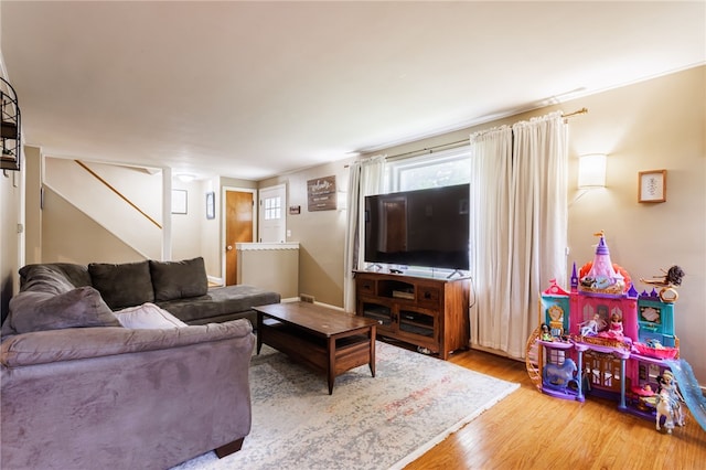 3389 Culver Rd, Irondequoit, NY 14622 - living room with wood finished floors and stairs
