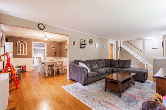 3389 Culver Rd, Irondequoit, NY 14622 - living room with light wood-type flooring and stairs