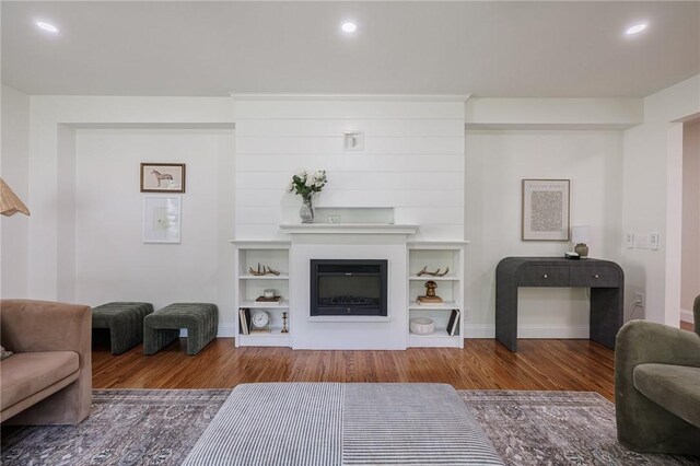 165 Culver Pkwy, Irondequoit, NY 14609 - living area featuring wood finished floors, recessed lighting, and a fireplace
