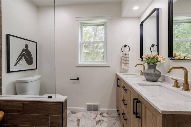 165 Culver Pkwy, Irondequoit, NY 14609 - full bath with marble look tile flooring, double vanity, and plenty of natural light