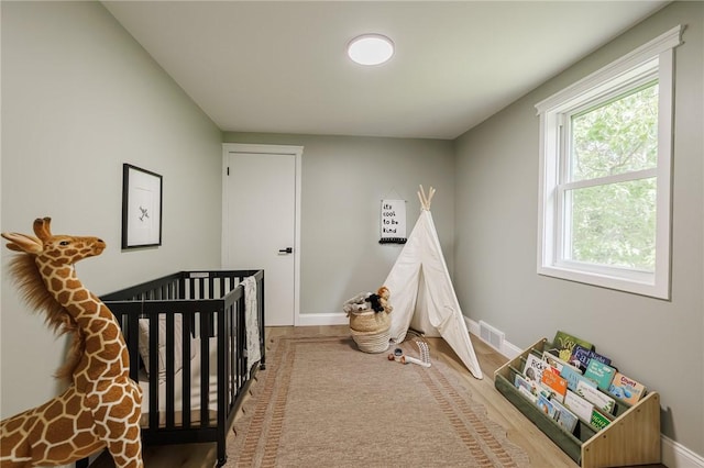 165 Culver Pkwy, Irondequoit, NY 14609 - bedroom featuring baseboards and a nursery area