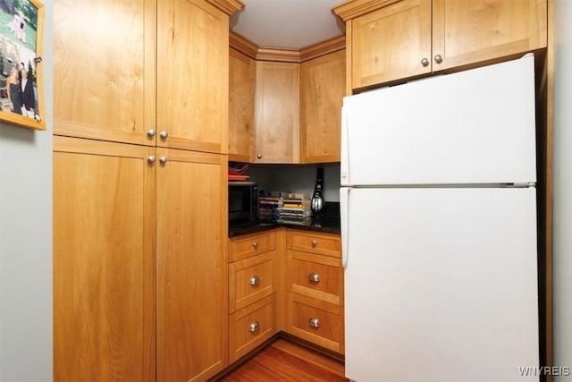 117 Halwill Dr, Amherst, NY 14226 - kitchen featuring freestanding refrigerator, dark wood-type flooring, and black microwave