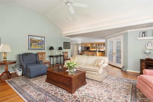 117 Halwill Dr, Amherst, NY 14226 - living room with light wood-style floors, french doors, ceiling fan, and vaulted ceiling