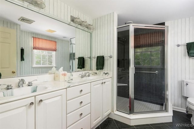 117 Halwill Dr, Amherst, NY 14226 - full bathroom featuring double vanity, tile patterned floors, and a shower stall