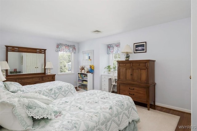117 Halwill Dr, Amherst, NY 14226 - bedroom with wood finished floors and baseboards